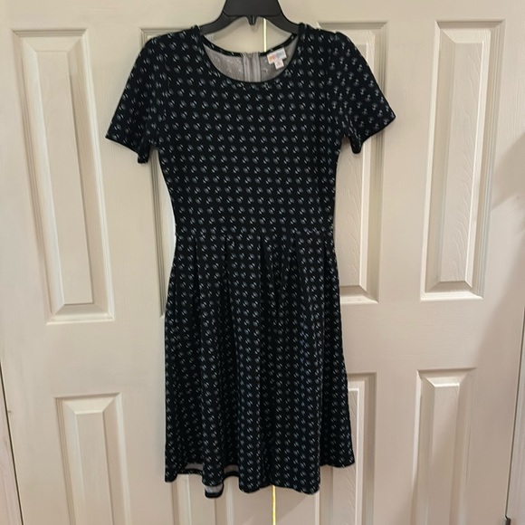 Black floral LuLaRoe dress with pockets and back zipper. Size medium. - Picture 1 of 3